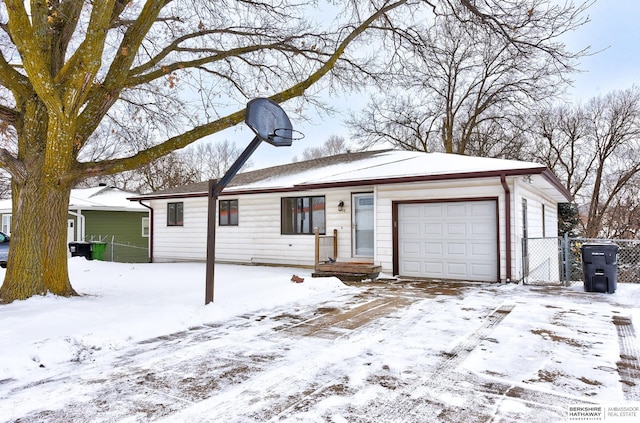 single story home featuring a garage