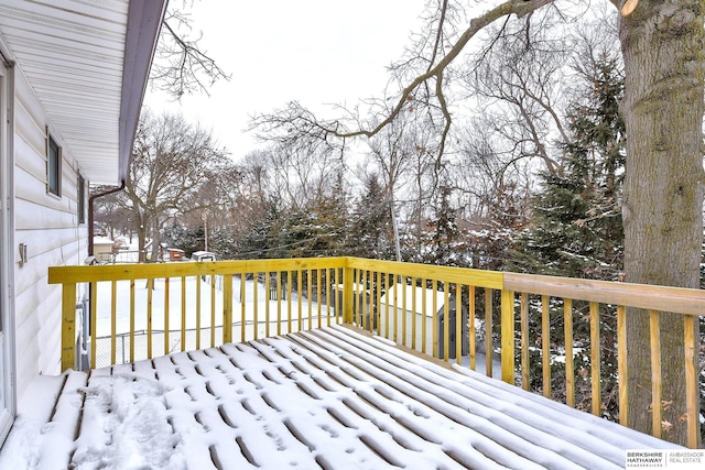 view of snow covered deck