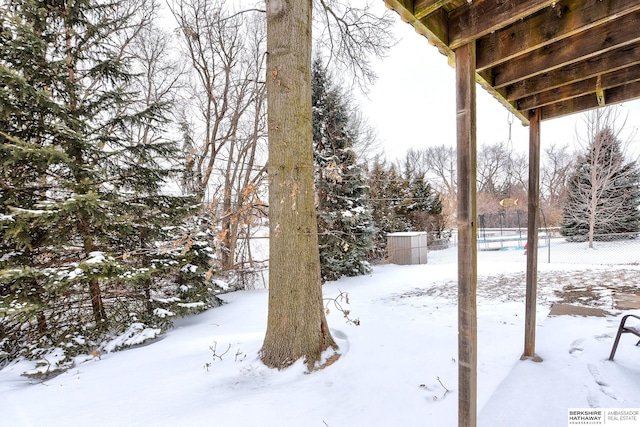 view of snowy yard