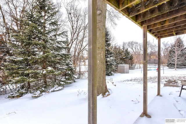 view of snowy yard