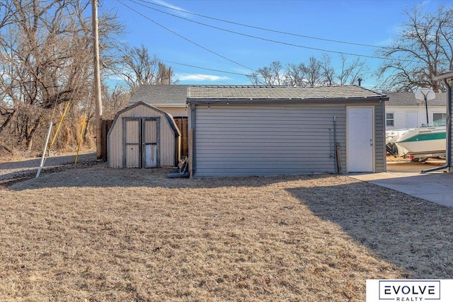 garage featuring a yard