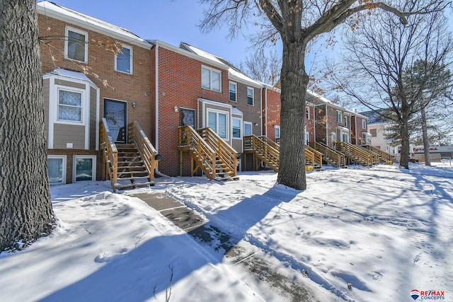 view of snow covered property