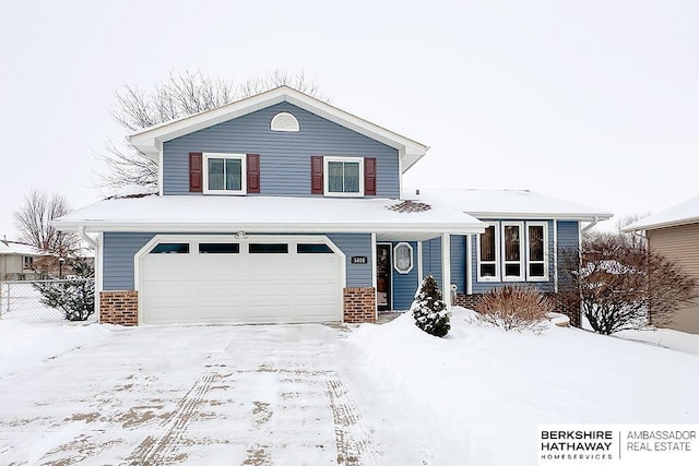 view of front of property featuring a garage