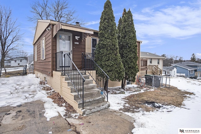 view of front of property with fence