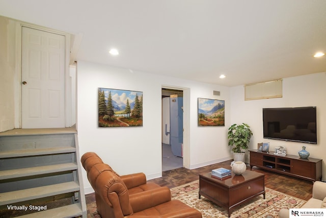 living room featuring dark hardwood / wood-style floors