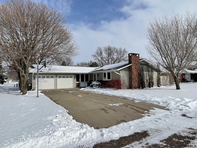 single story home featuring a garage