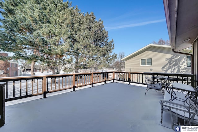 view of snow covered deck