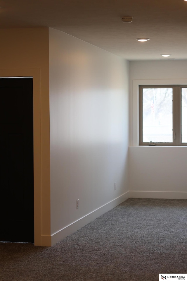 307 S 55th St, Lincoln, NE 68510 - unfurnished room with carpet, baseboards, a smoke detector, and recessed lighting
