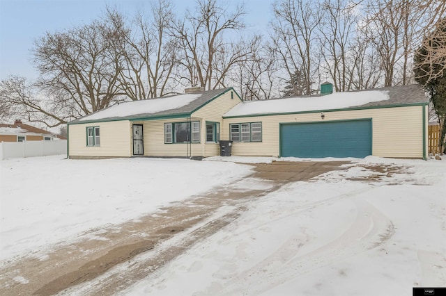 view of front of property with a garage