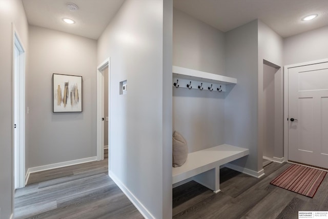 mudroom with recessed lighting, wood finished floors, and baseboards