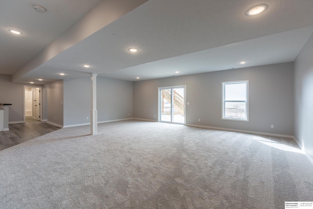 interior space featuring recessed lighting, carpet flooring, and baseboards