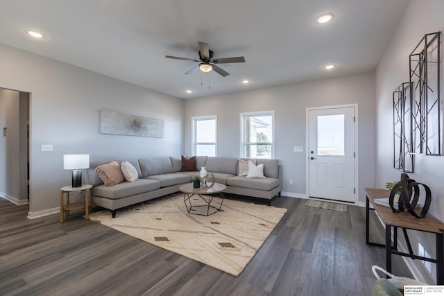 living area with a ceiling fan, baseboards, dark wood-style flooring, and recessed lighting