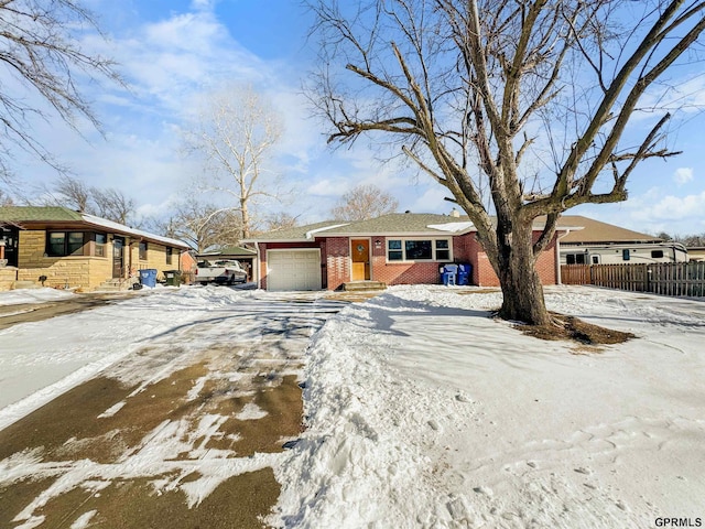 view of front of property featuring a garage