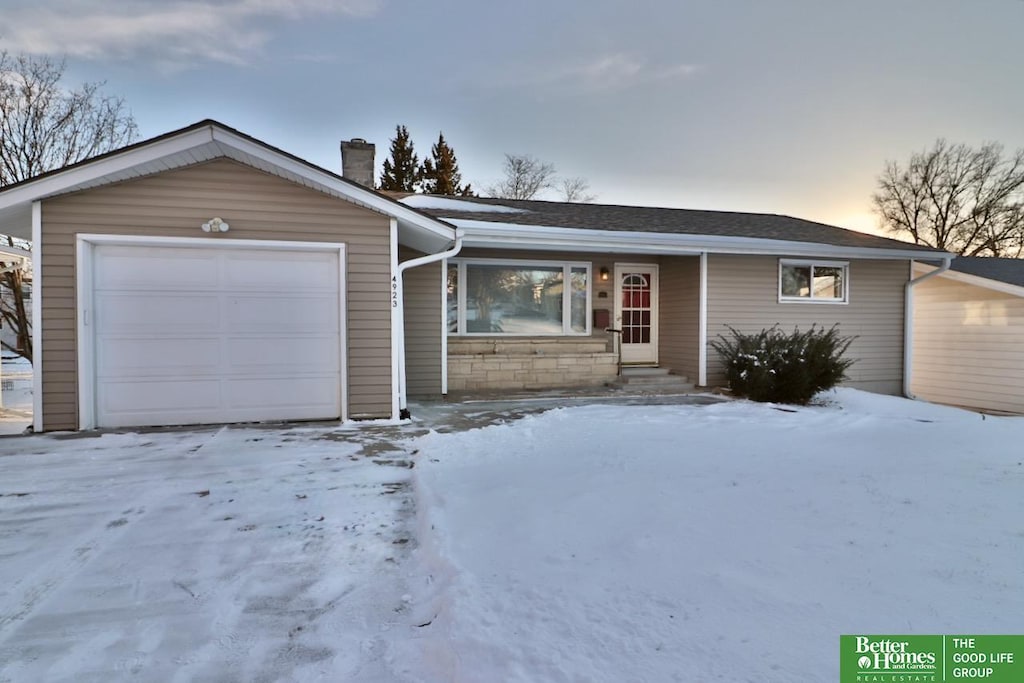 ranch-style home with a garage