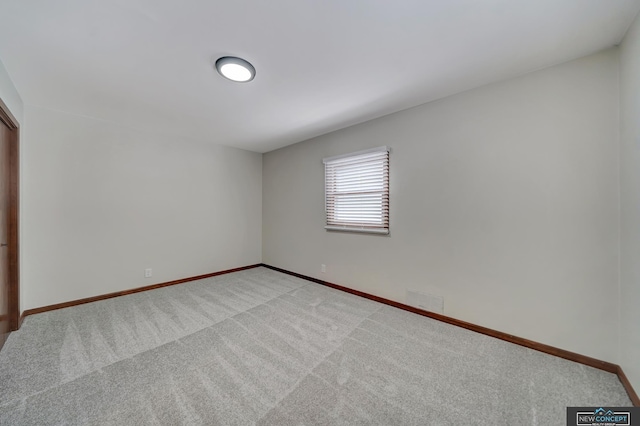 view of carpeted spare room