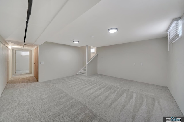 basement with light carpet