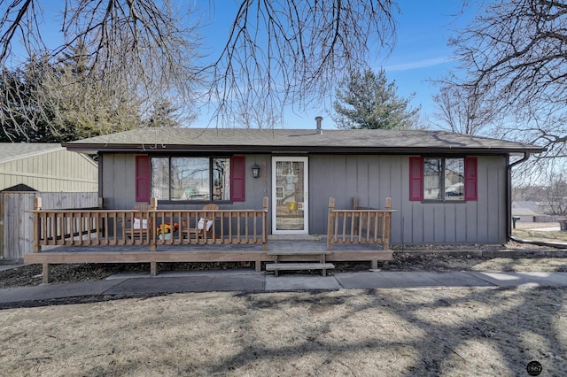 view of front facade featuring a wooden deck