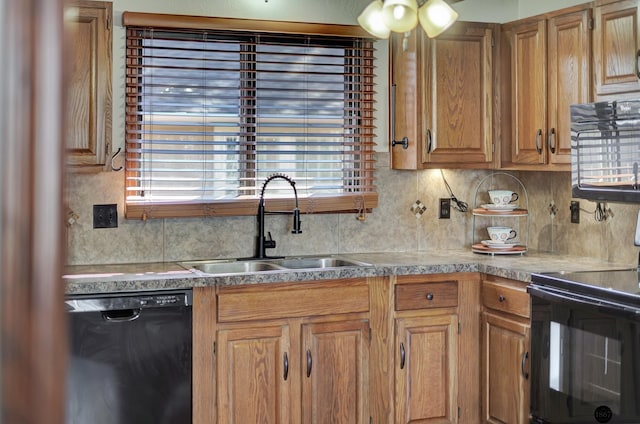 kitchen featuring black appliances, tasteful backsplash, plenty of natural light, and a sink