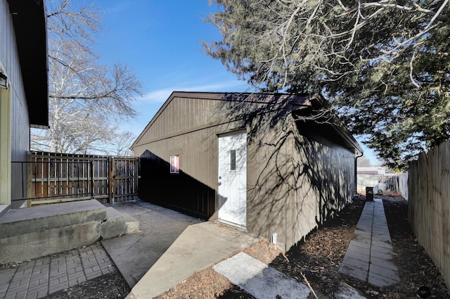 view of property exterior featuring a patio area and a fenced backyard