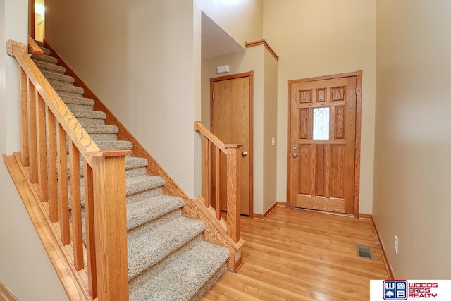 entrance foyer featuring hardwood / wood-style floors