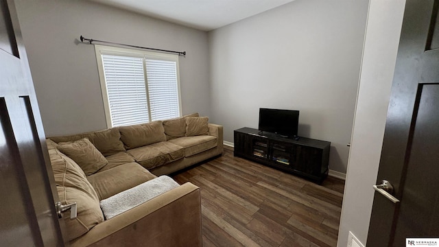 living room with dark wood-type flooring