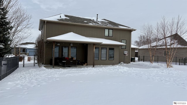 view of snow covered property