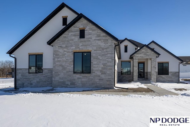 8909 Appaloosa Ln, Lincoln, NE 68520 - view of front of property featuring stucco siding and stone siding