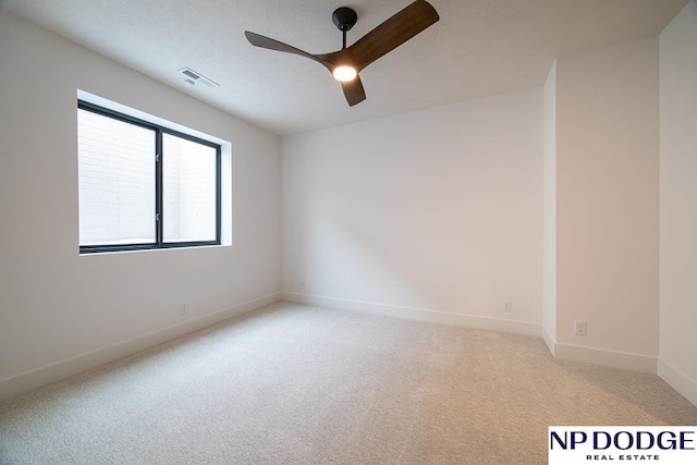 8909 Appaloosa Ln, Lincoln, NE 68520 - carpeted empty room with ceiling fan, baseboards, and visible vents