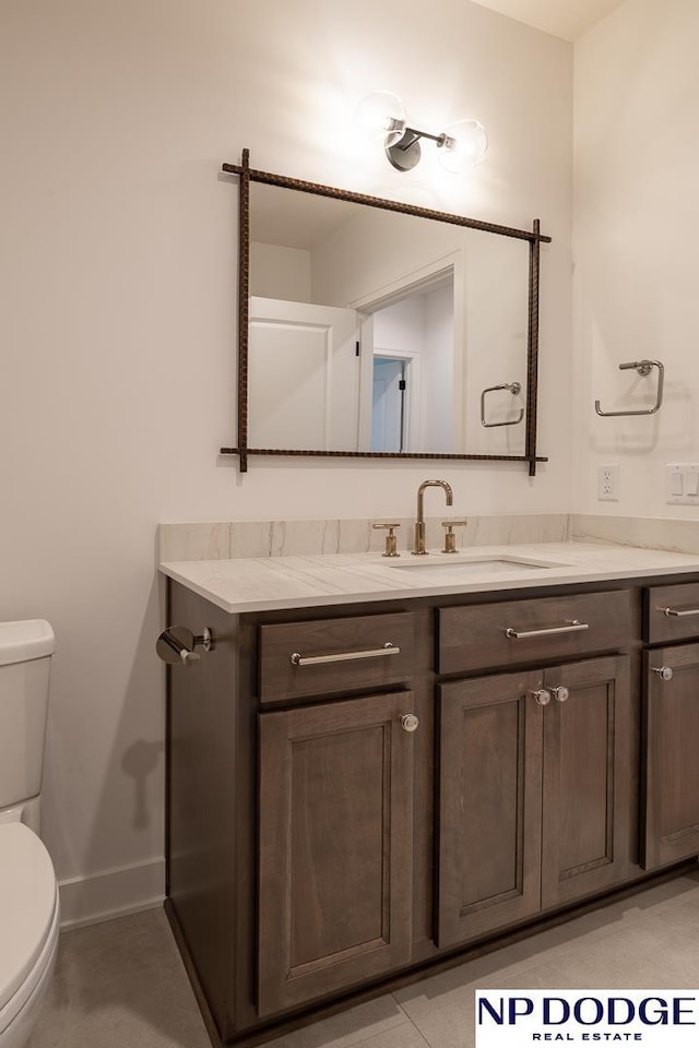 8909 Appaloosa Ln, Lincoln, NE 68520 - half bathroom with toilet, vanity, and baseboards