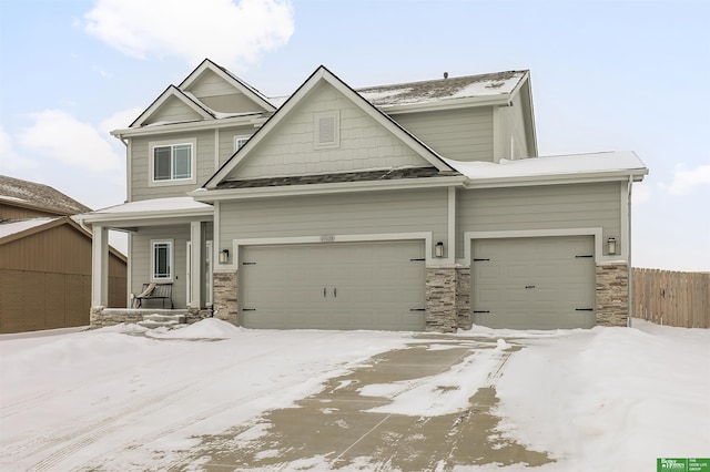 craftsman-style home with a garage