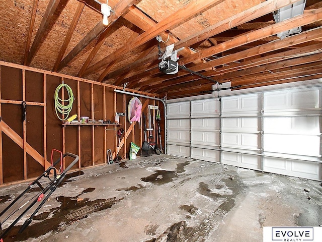 garage featuring a garage door opener