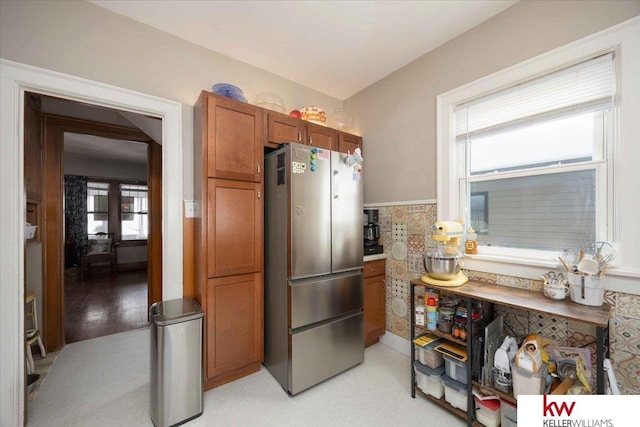 kitchen featuring stainless steel refrigerator