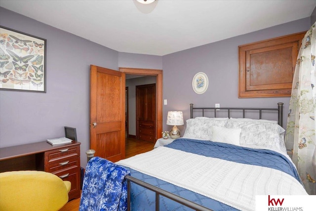 bedroom featuring hardwood / wood-style flooring