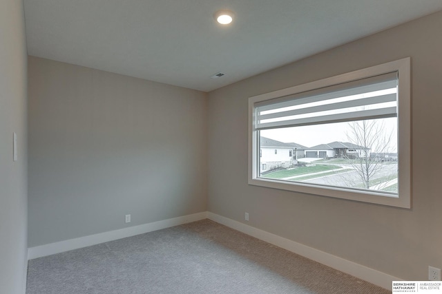 view of carpeted spare room