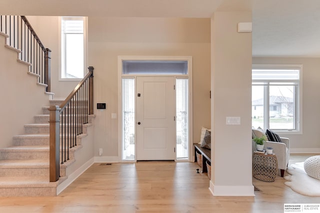 foyer with light wood-type flooring