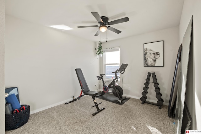 exercise area featuring carpet floors and ceiling fan