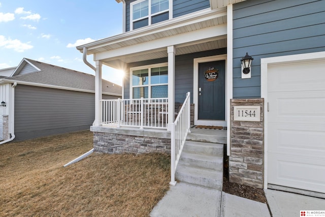 doorway to property featuring a porch