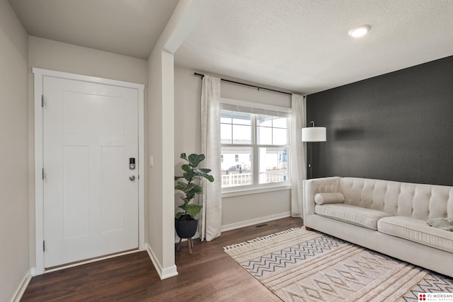 foyer featuring dark hardwood / wood-style flooring