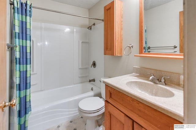 full bathroom featuring shower / tub combo with curtain, vanity, toilet, and a textured ceiling