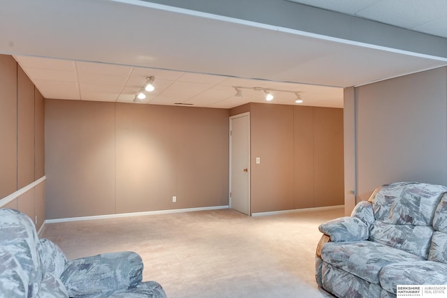 living room featuring track lighting and light colored carpet