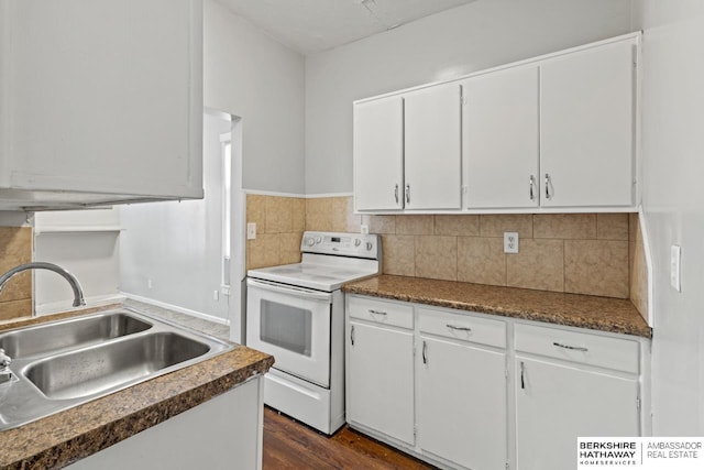 kitchen with decorative backsplash, sink, white cabinetry, and white range with electric stovetop