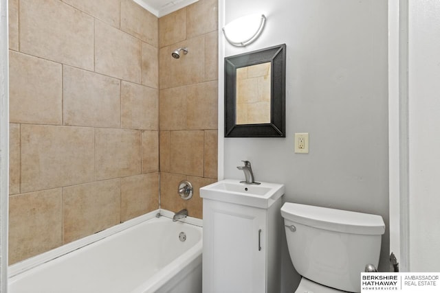 full bathroom with tiled shower / bath combo, vanity, and toilet