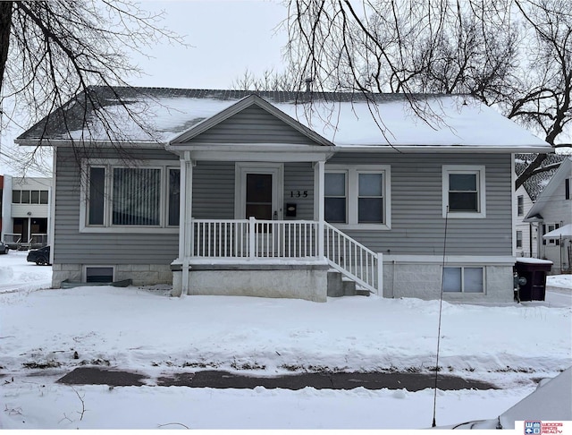 view of front of home featuring covered porch