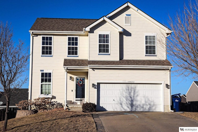 view of property featuring a garage