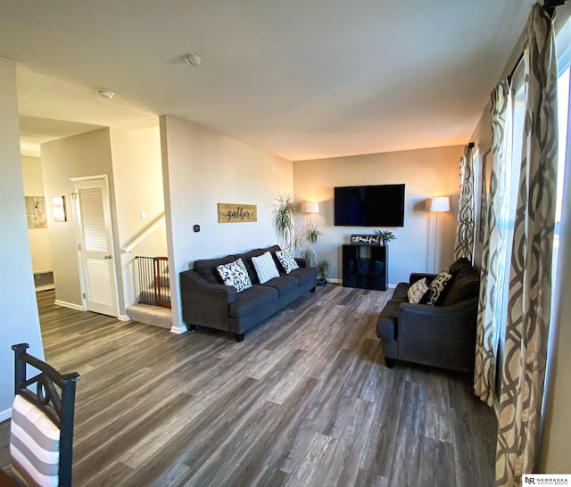 living room with dark wood-type flooring