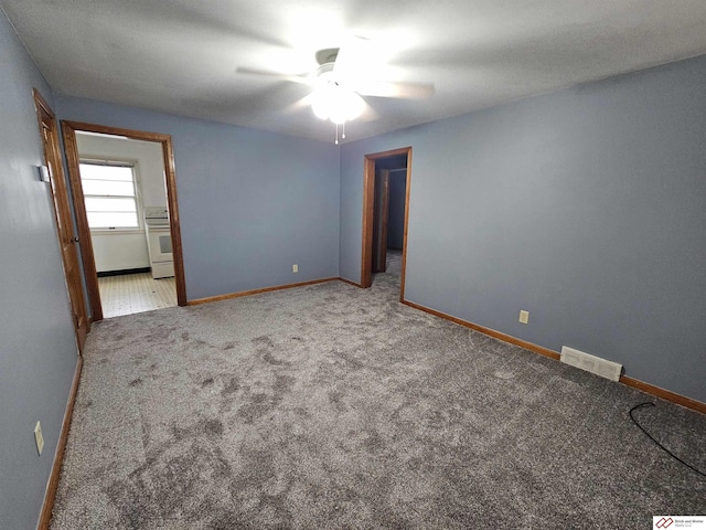 unfurnished bedroom with visible vents, ceiling fan, baseboards, and carpet