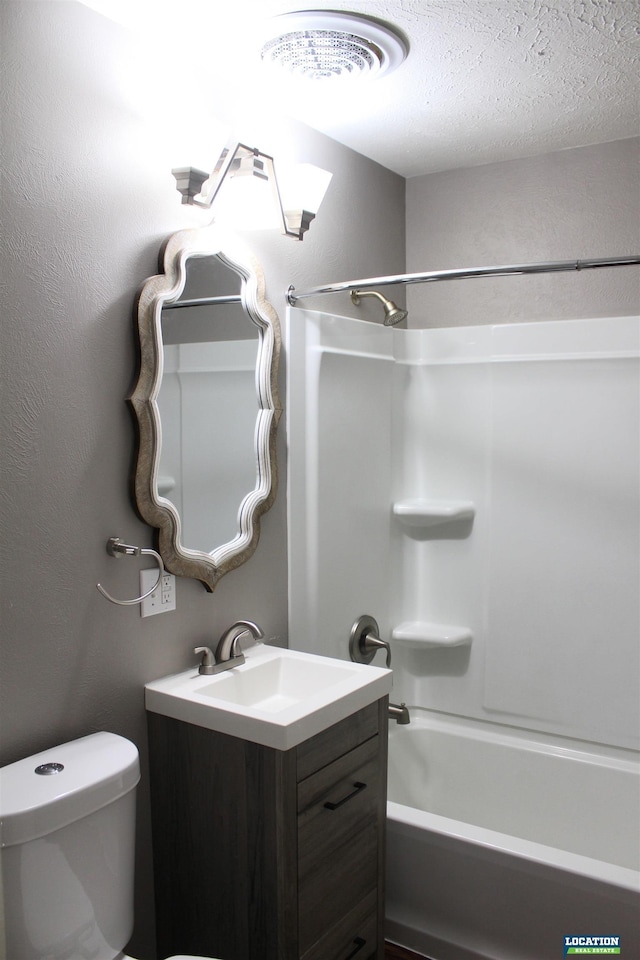 bathroom with toilet, shower / bathtub combination, visible vents, and vanity