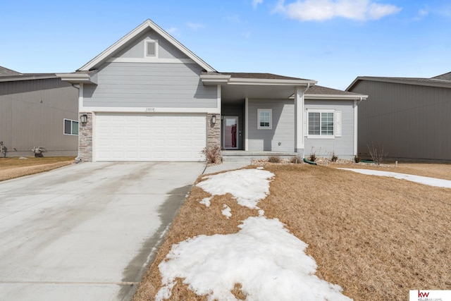 view of front facade with driveway and an attached garage