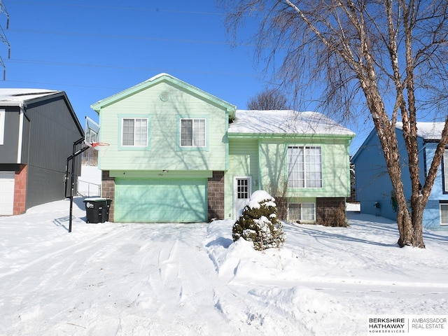 view of snow covered facade