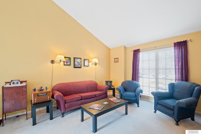 living room featuring baseboards, lofted ceiling, and light carpet